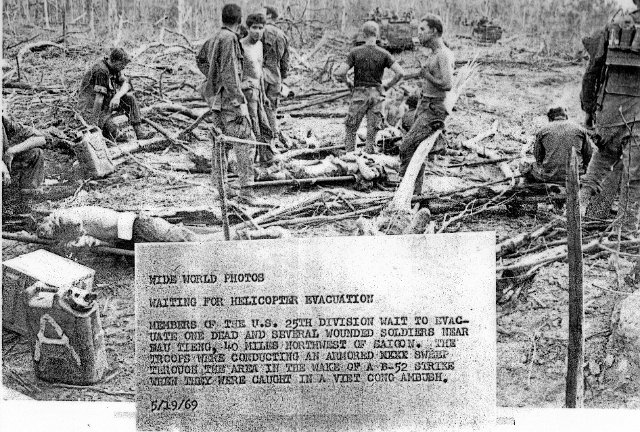 Joe Esser and Others lie wounded awaiting Medivac 1969